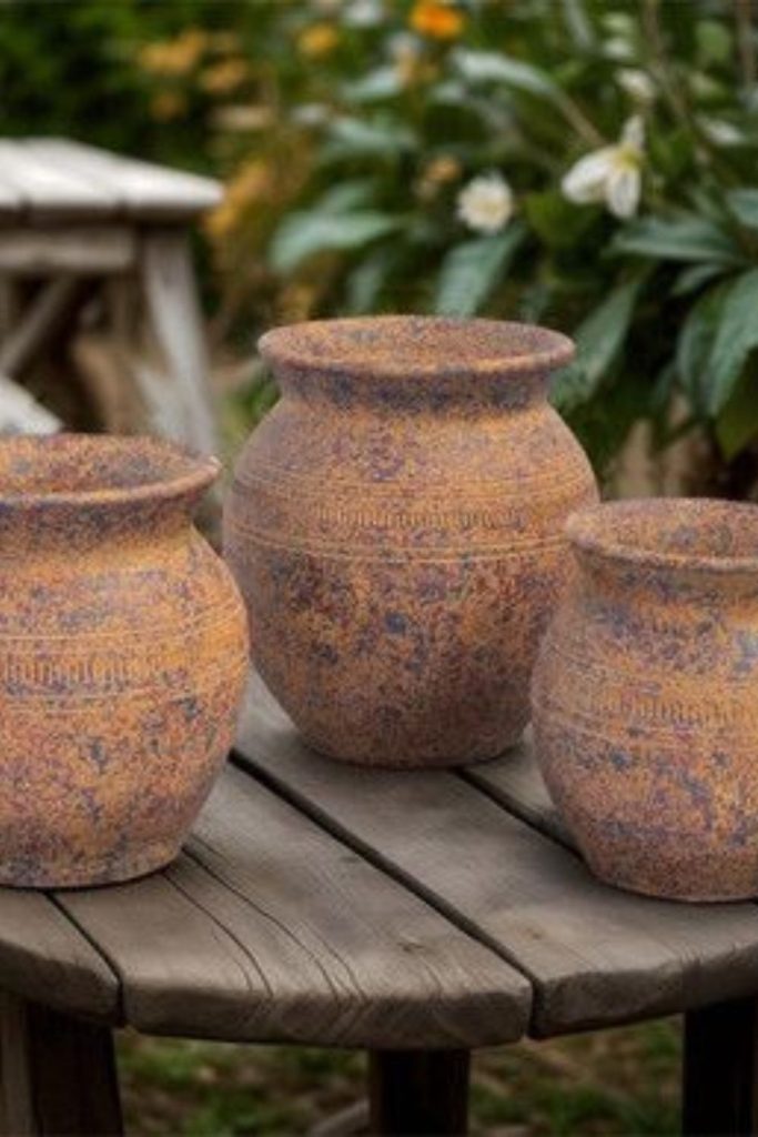 Rustic solara warm glowing clay vessel
