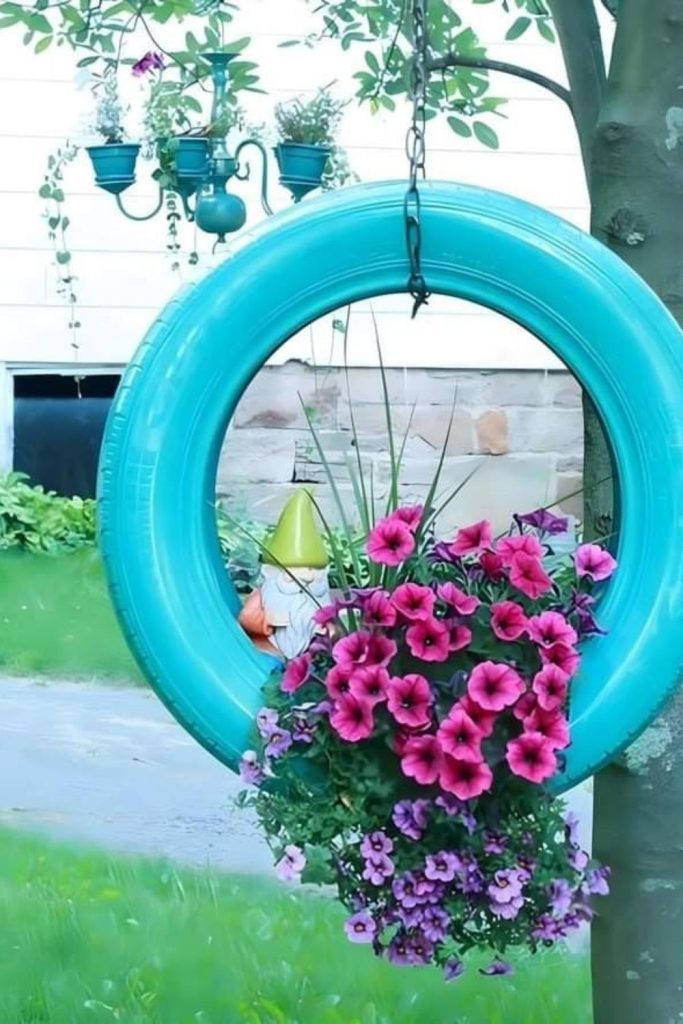 Hanging tire vertical flower tower planter
