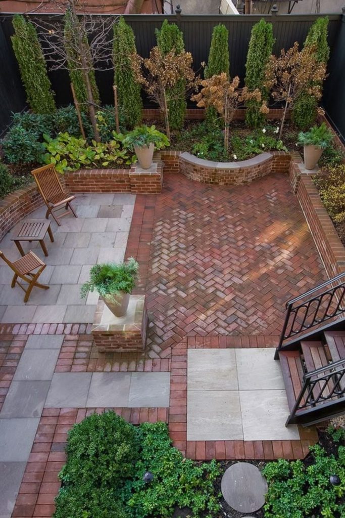 Vintage brick garden with roses.