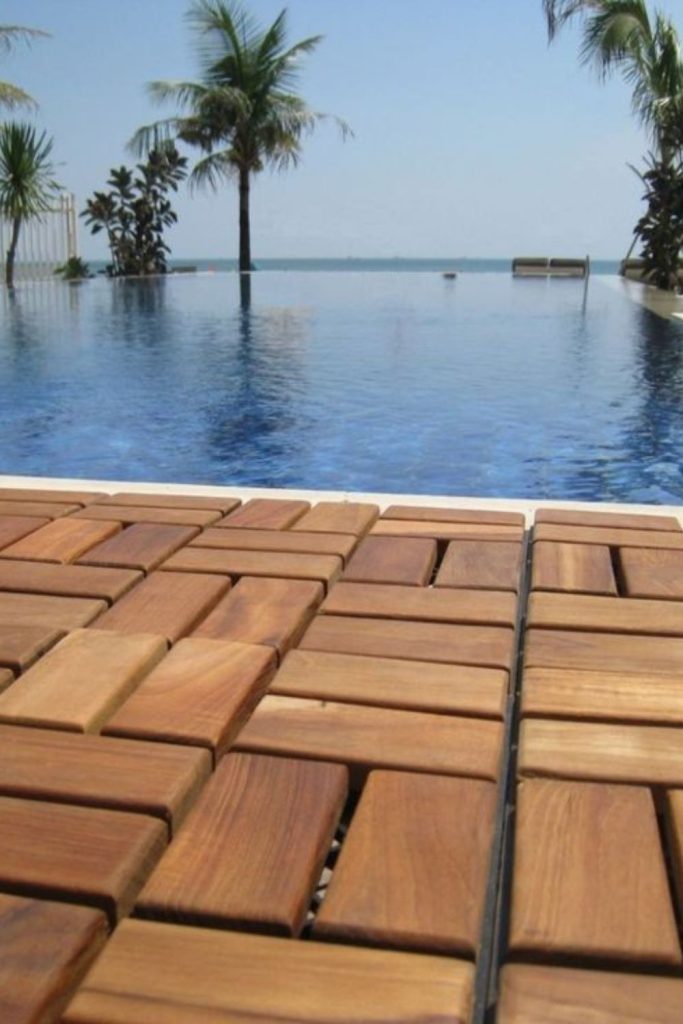 Geometric wooden crisscross pool deck pattern