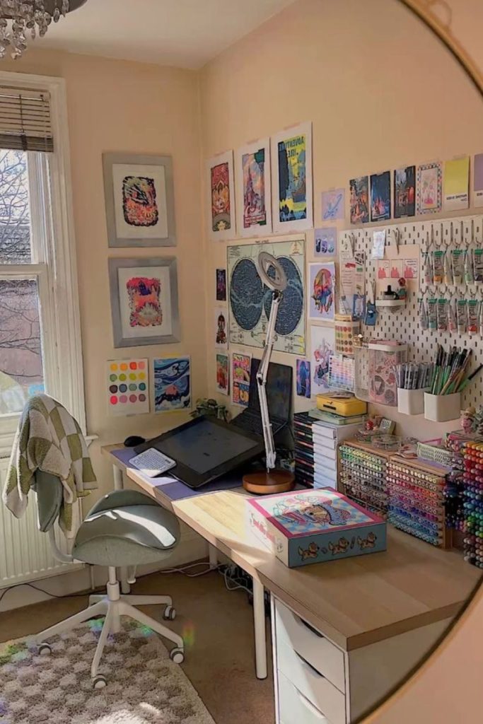 Creative gallery-inspired dorm desk arrangement.