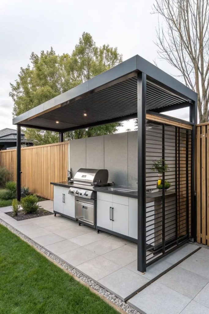 Modern black steel covered outdoor kitchen.