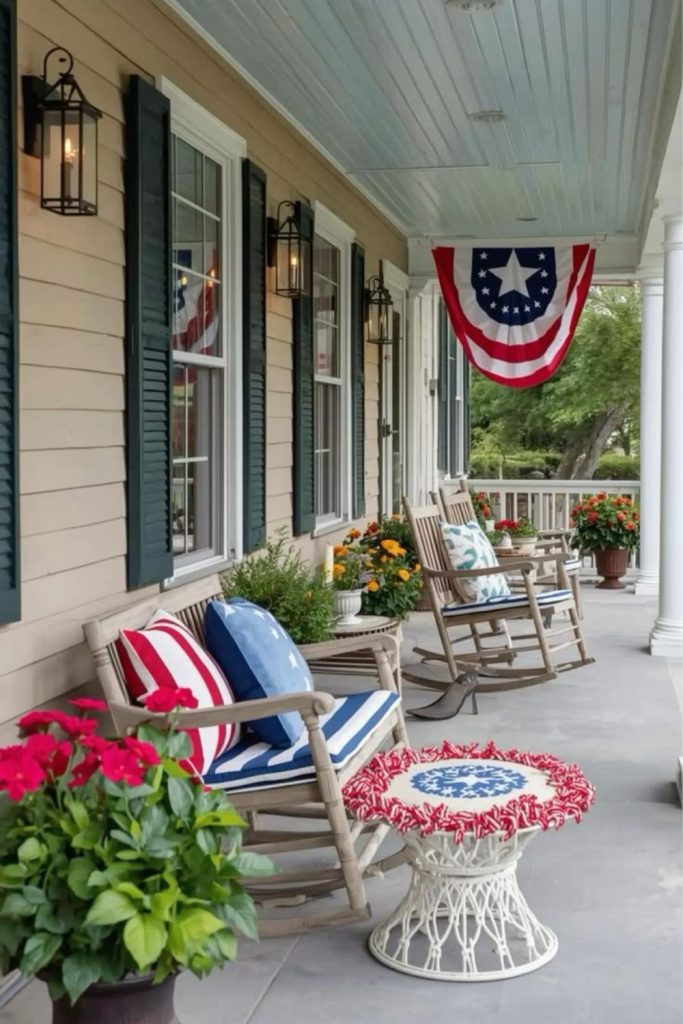 Coastal porch with driftwood decor flags and soft ocean inspired colors