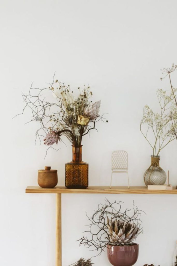 Dried floral shelf decor styling.