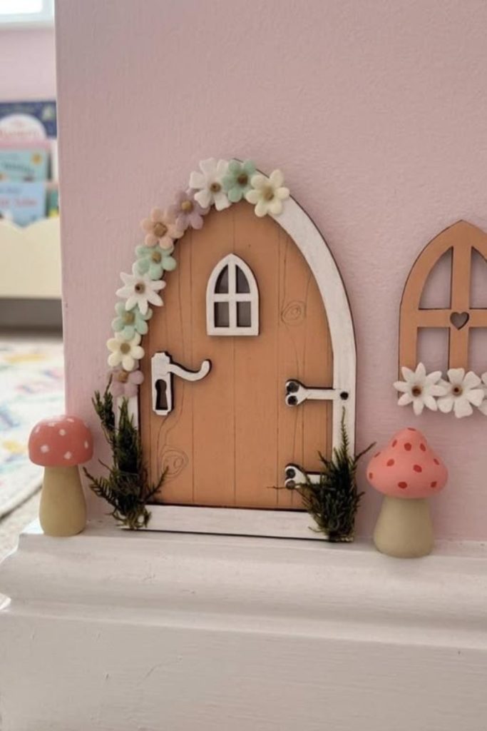 Tiny fairy door whimsical wall accent.