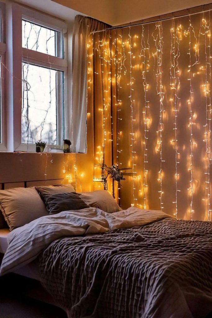 Fairy light waterfall glowing wall feature.