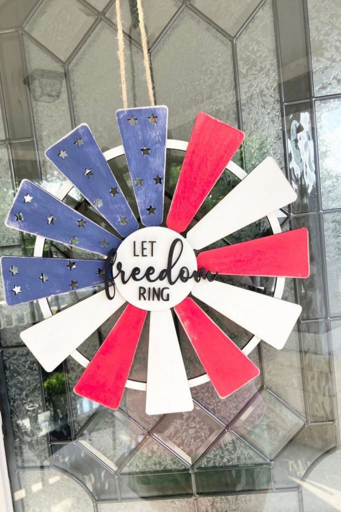 Patriotic windmill themed rustic door sign.