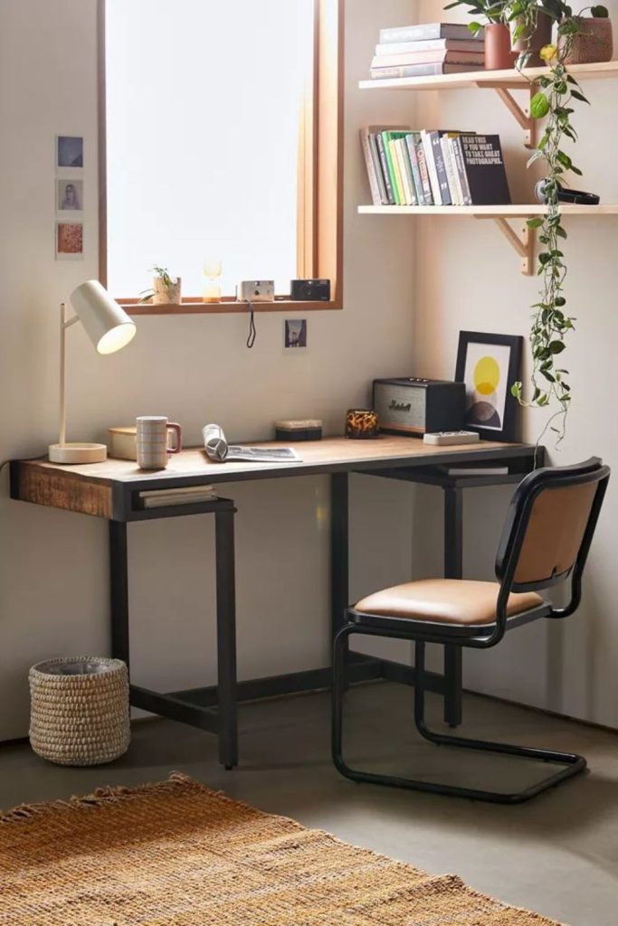 Industrial loft-style dorm study desk.