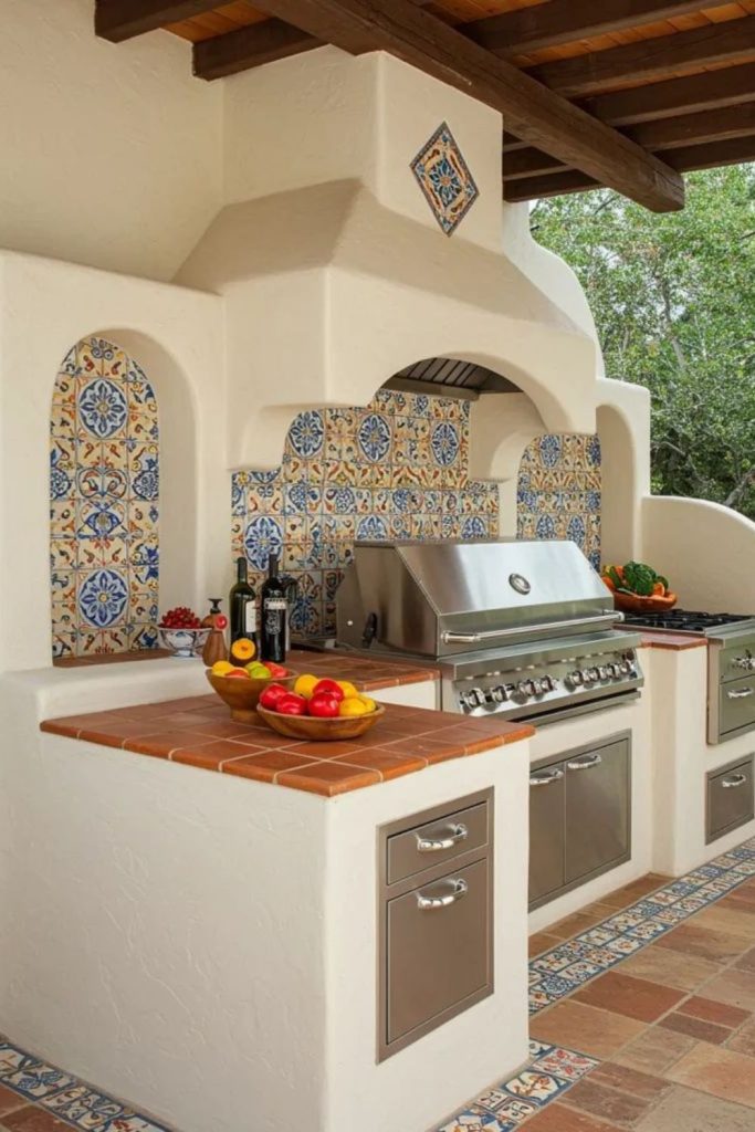 Coastal tile Mediterranean grill courtyard design