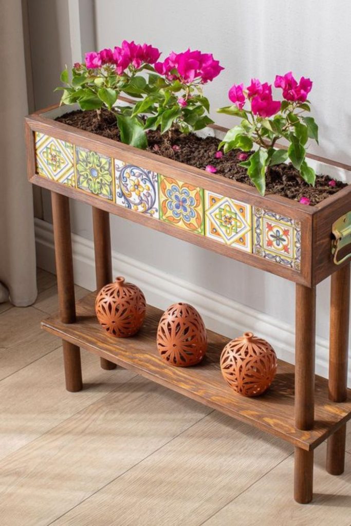 Colorful mosaic tiled plant shelf decor