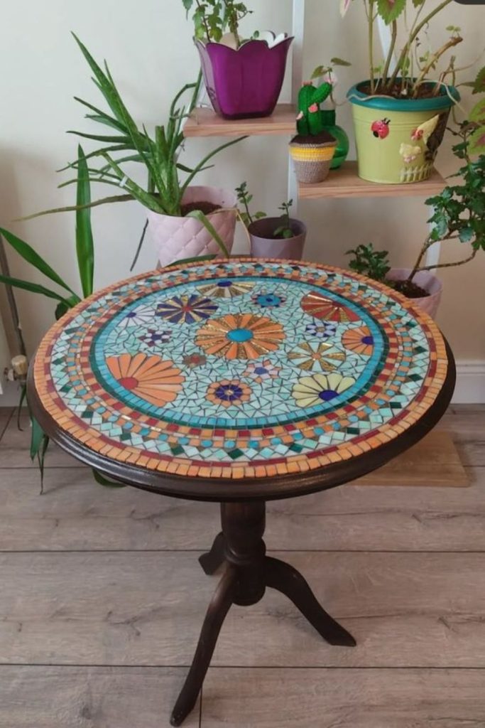 Mosaic tile decorative plant table.
