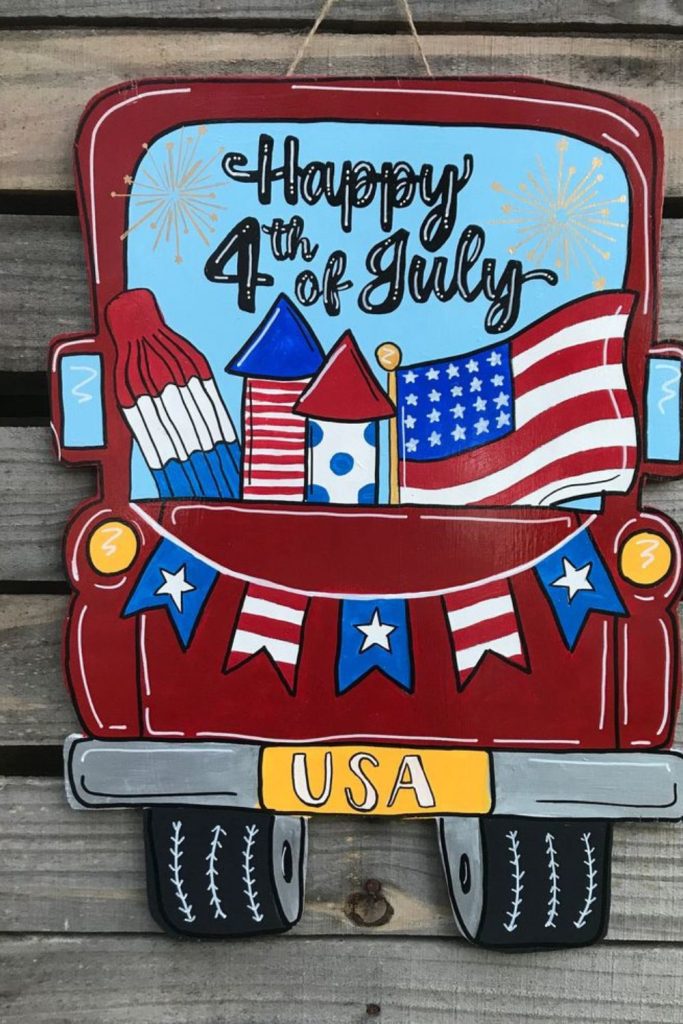 Festive parade wagon patriotic door decor.