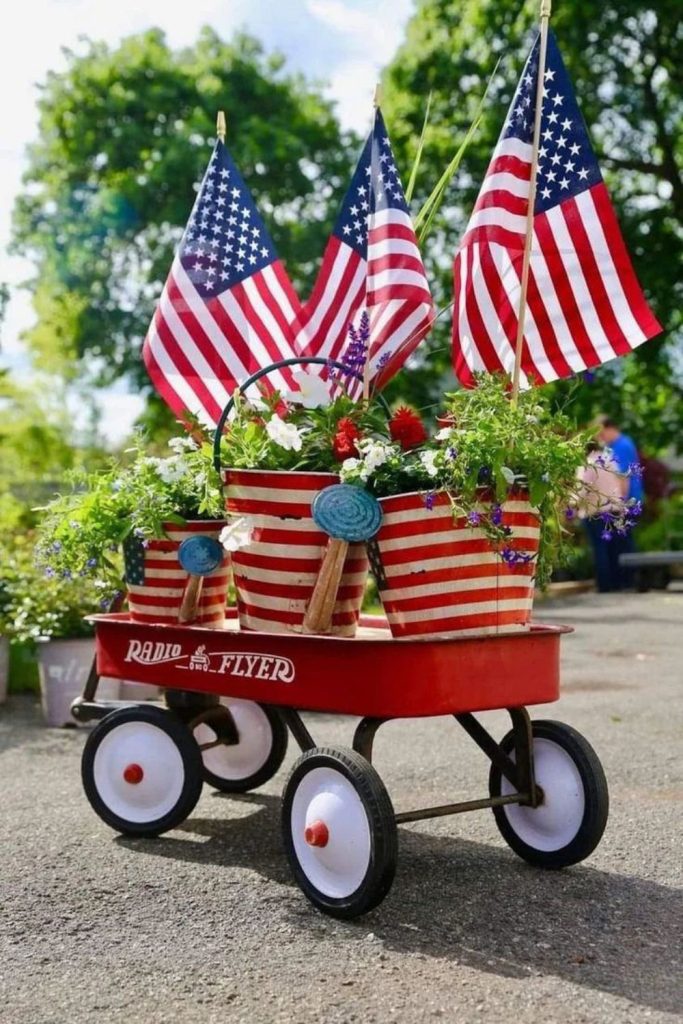 Vintage wagon overflowing with festive flowers