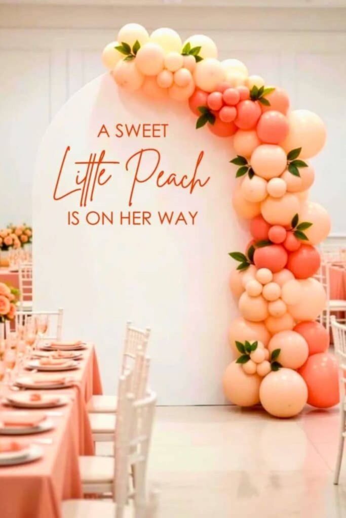 Peach blossom baby shower floral display.