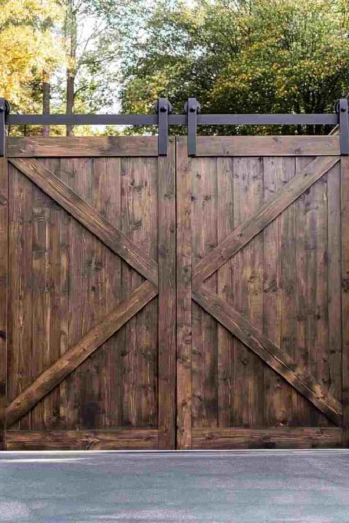 Sliding barn style wooden farm gate