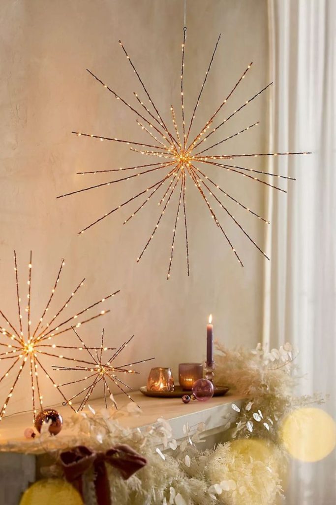 Hanging glass orbs celestial wall design.