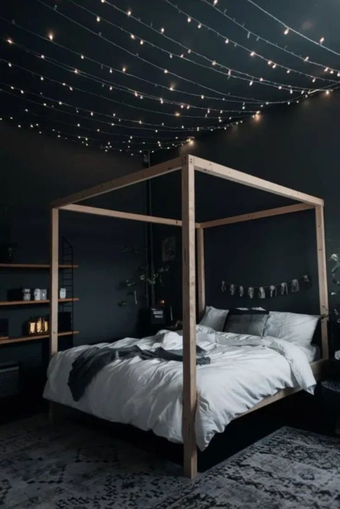 Mystical black crescent inspired bedroom interior.