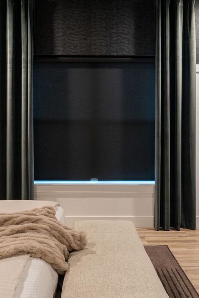 Modern charcoal curtains and roller blinds.