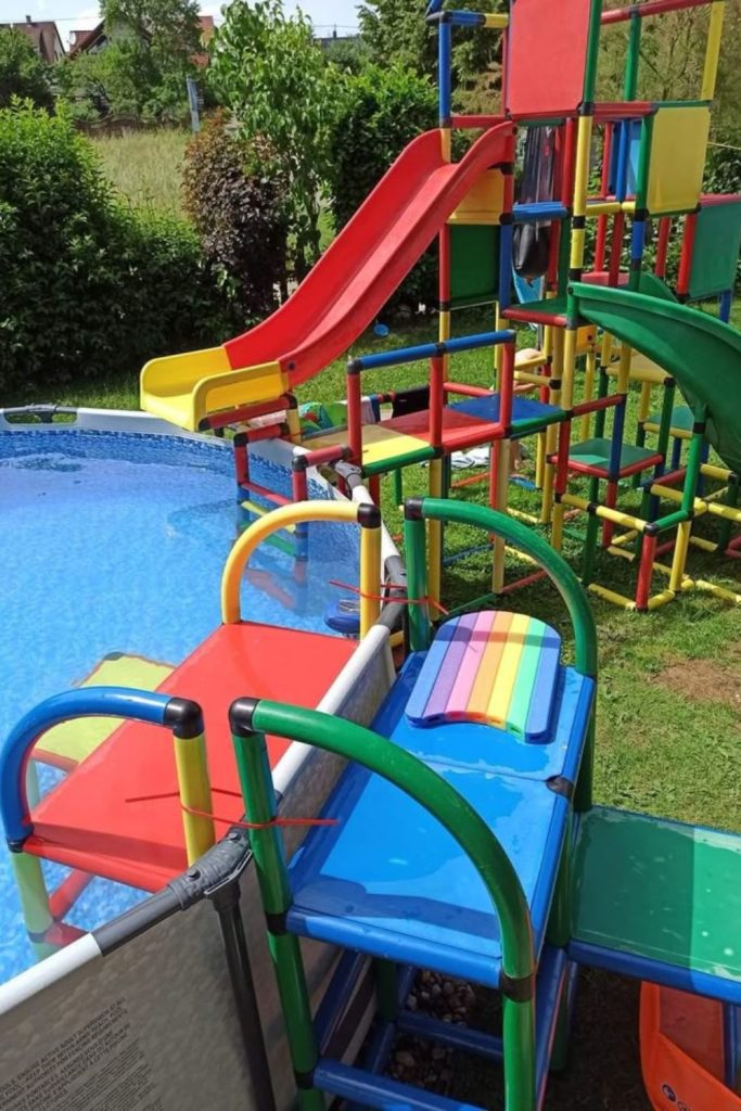 Colorful DIY painted pool ladder idea.