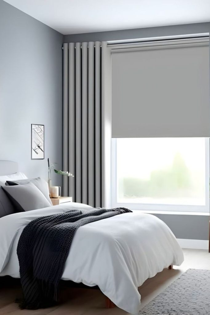 Soft grey curtains with matching blinds.