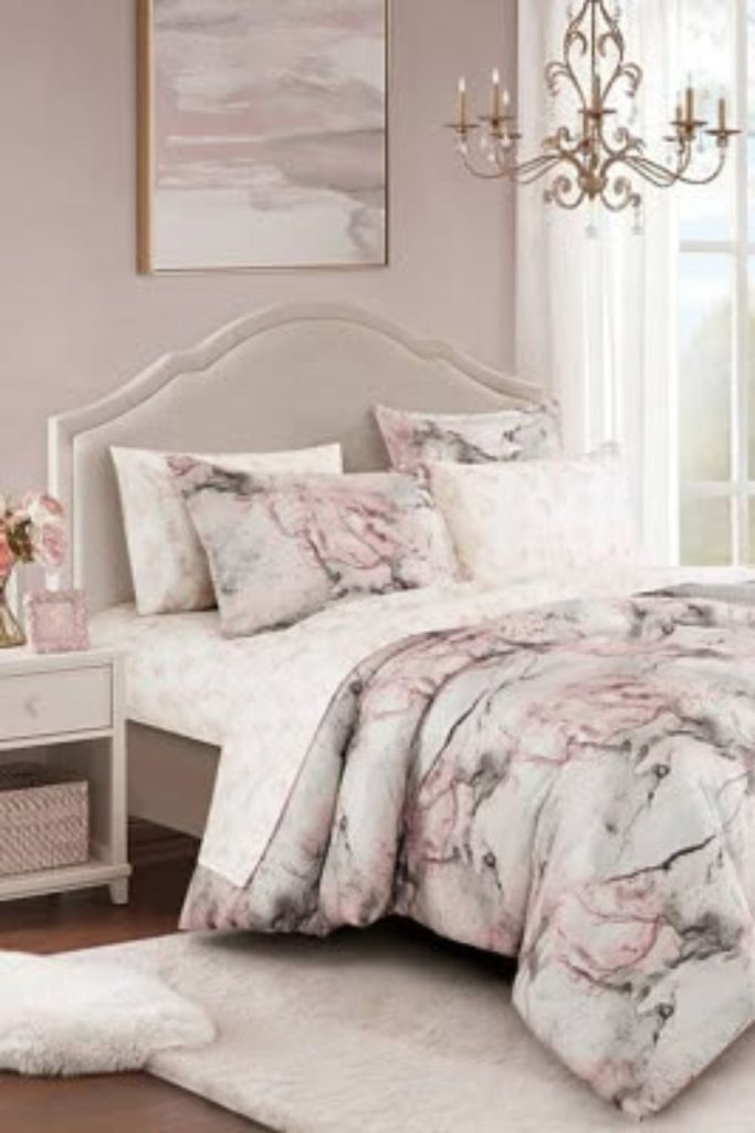 Grey marble and pink bedroom.