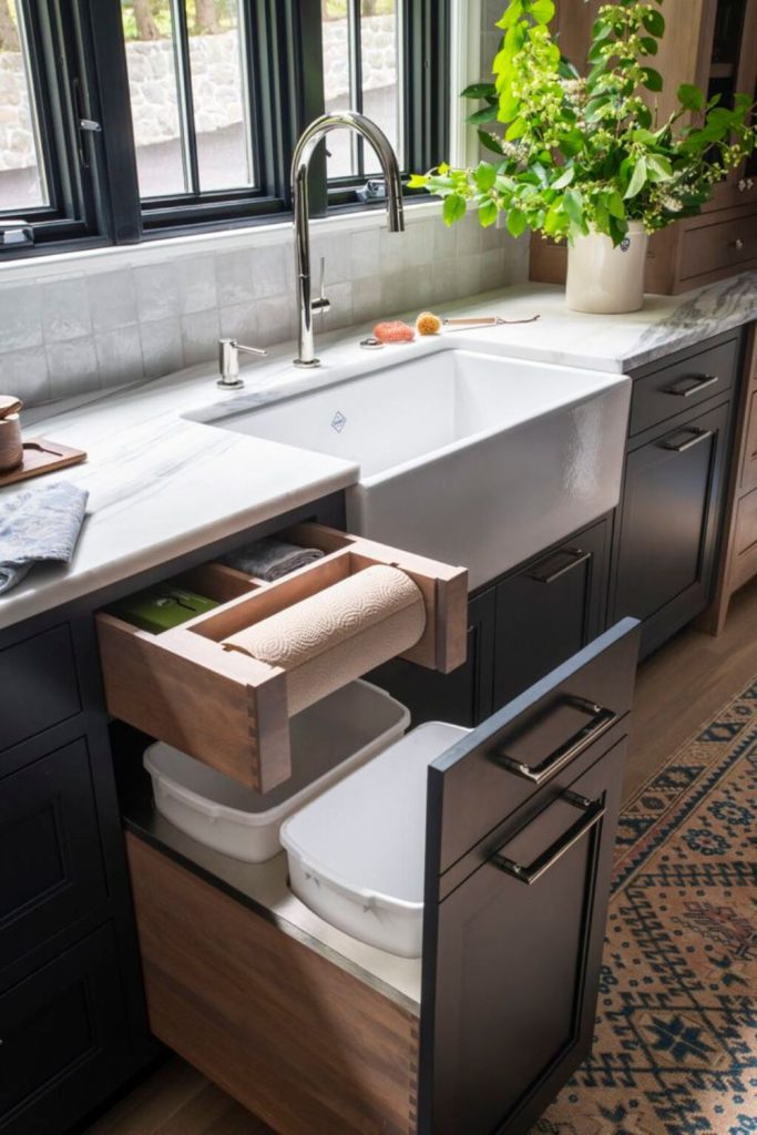 Hidden storage kitchen island with sink.