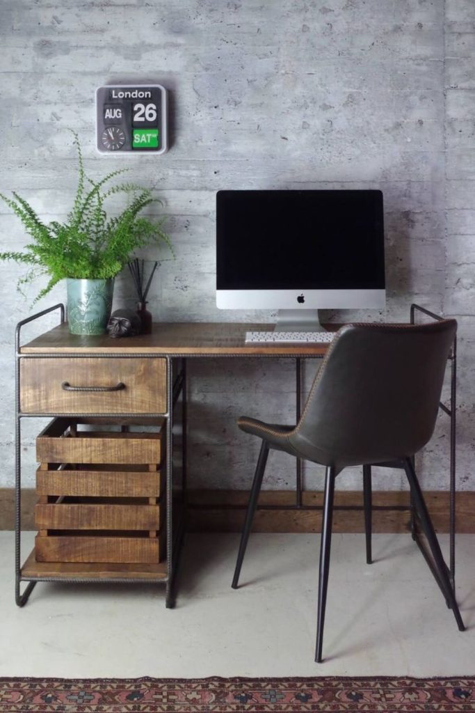 Industrial wood and metal bedroom desk.