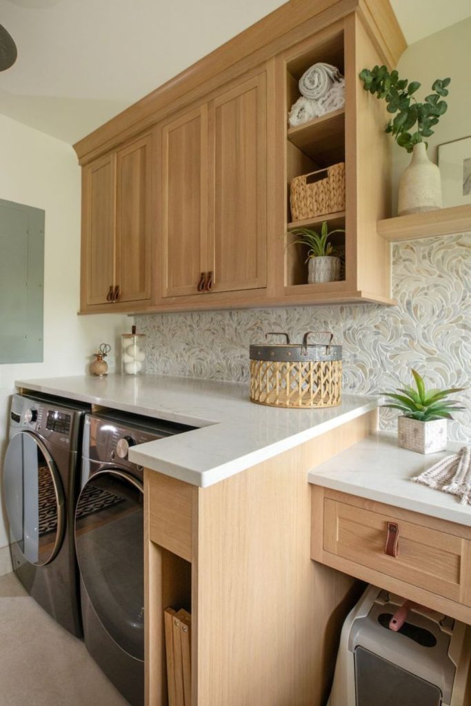 Maple wood laundry room cabinets.