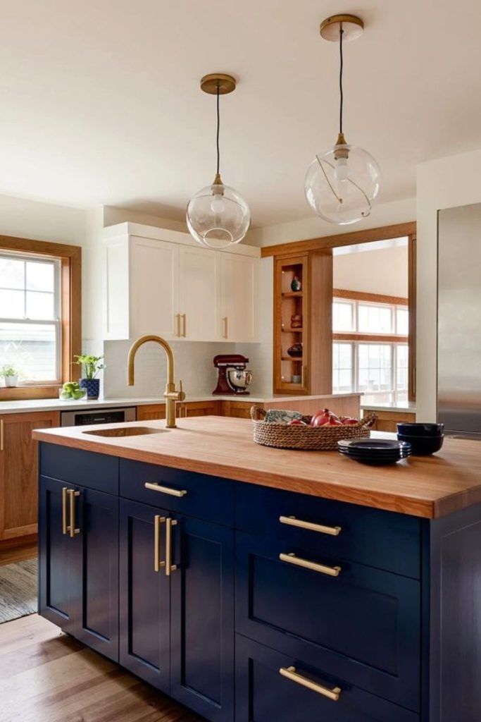Midnight blue kitchen island with sink.