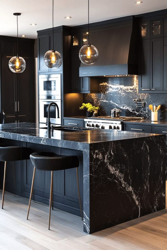 Modern black kitchen island with sink.
