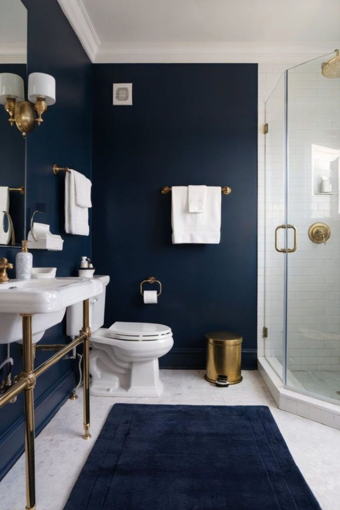Navy blue jewel box bathroom.