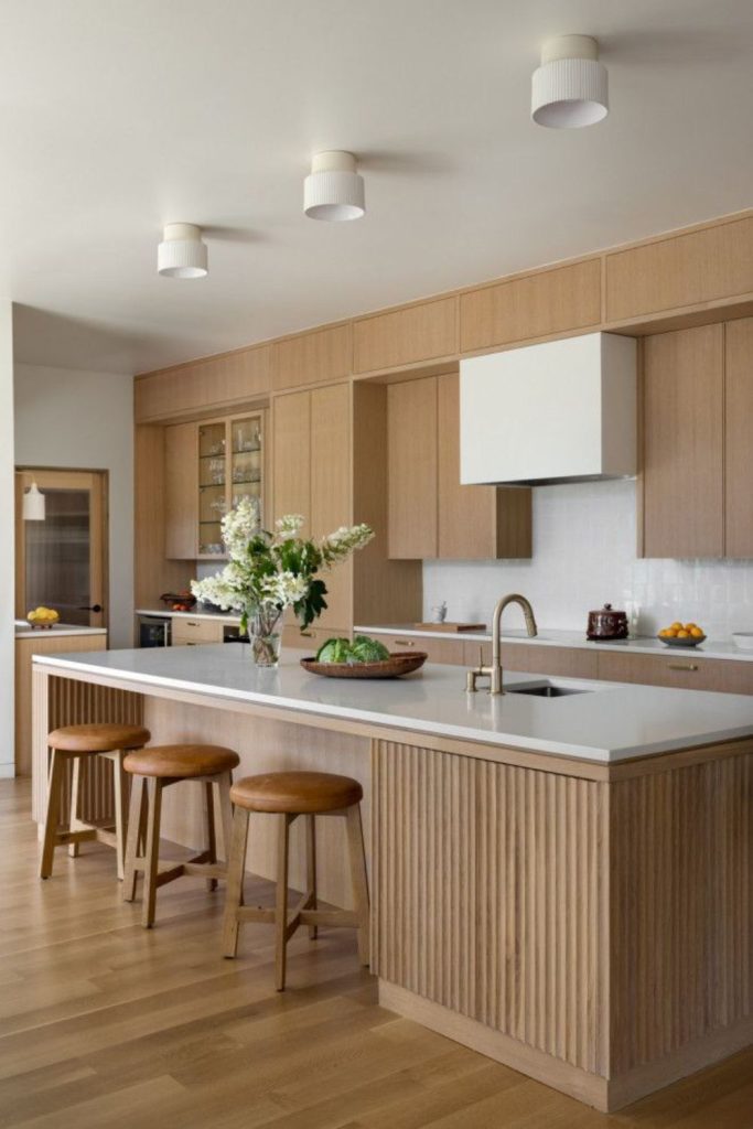 Scandinavian birch kitchen island with sink.