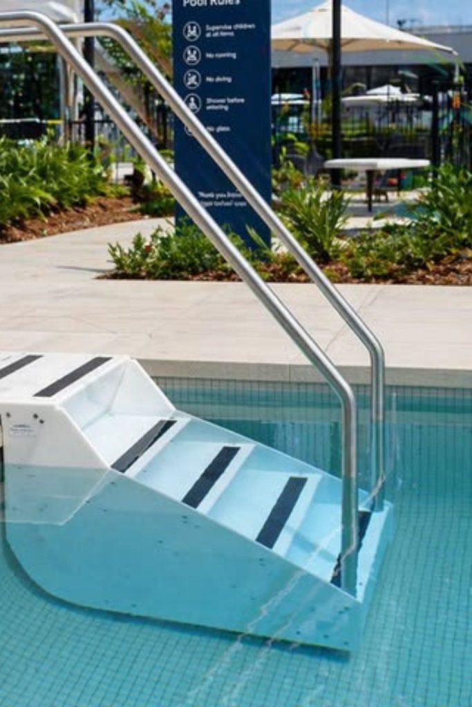 Tropical palm inspired pool ladder design.