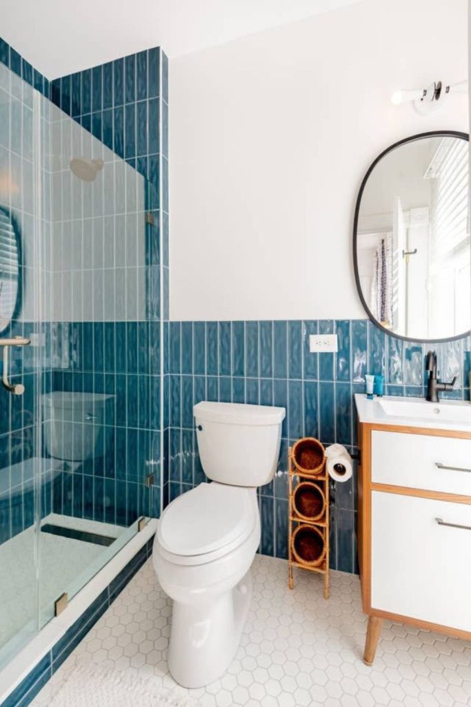 Vertical tile compact bathroom design.