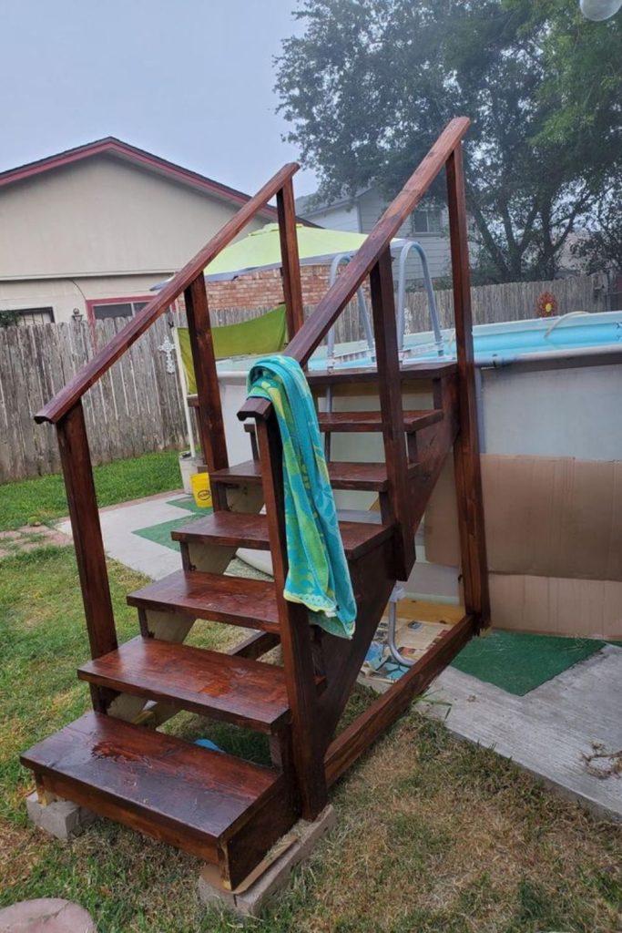 Wide deck stair pool ladder idea.