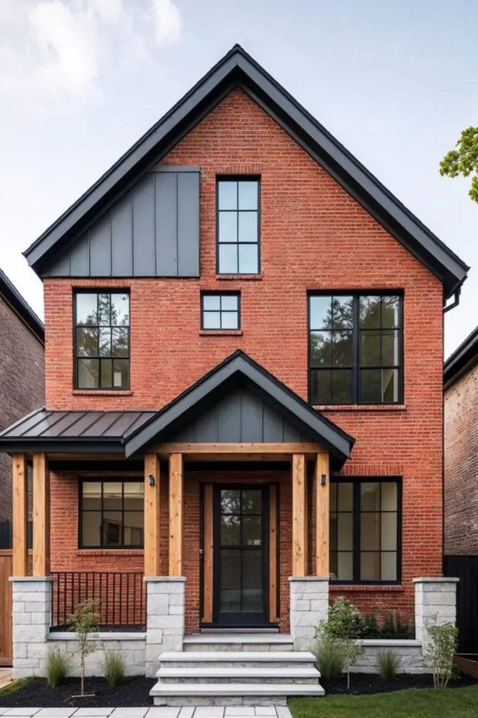 Brick red house with charcoal accents.