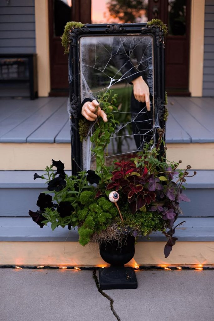 Cracked mirror gothic Halloween porch display.