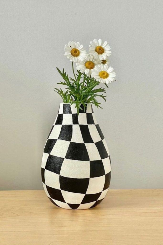 Checkerboard bloom pottery painting pattern.