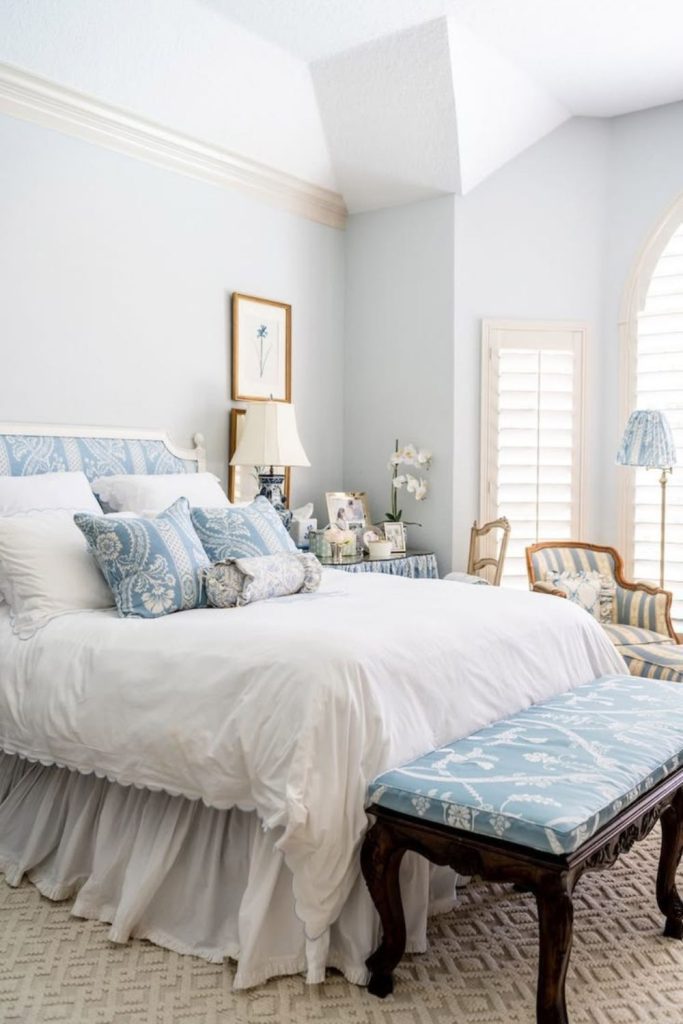 Curated thrifted grandmillennial bedroom.
