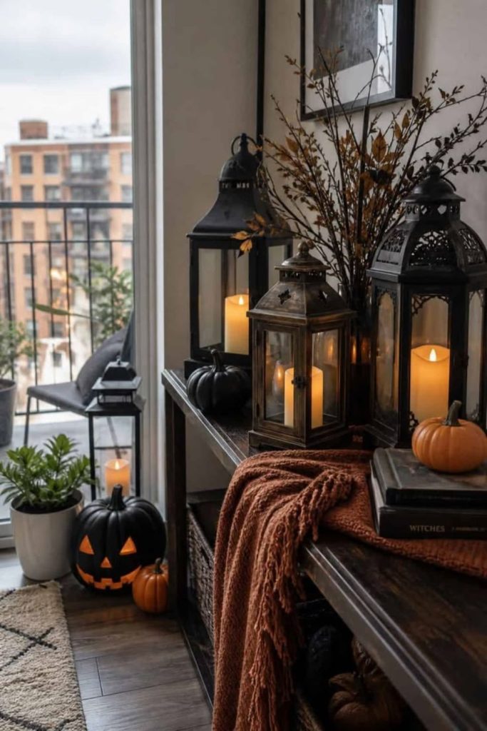 Rustic farmhouse Halloween corner with lanterns.