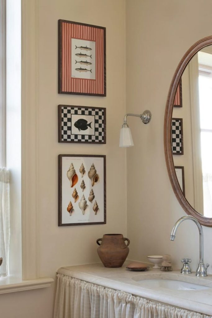 Bathroom gallery wall with mirror