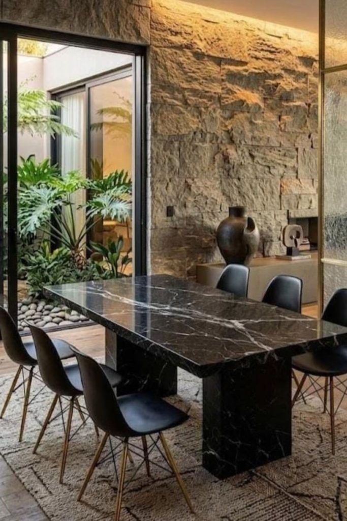 Black marble luxury dining room design.