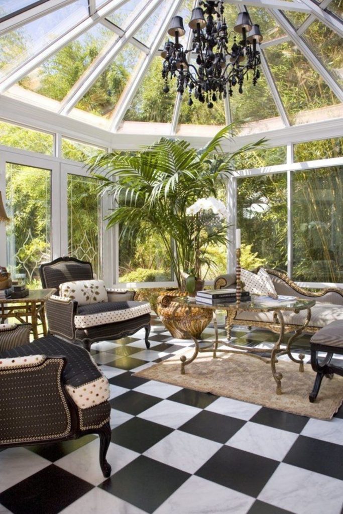 Mid-century conservatory with stylish wooden furniture.