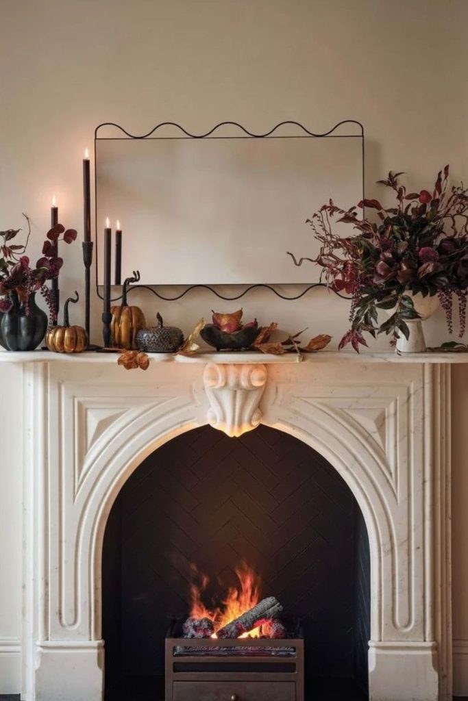 Modern metallic mantel with contemporary fall accents.
