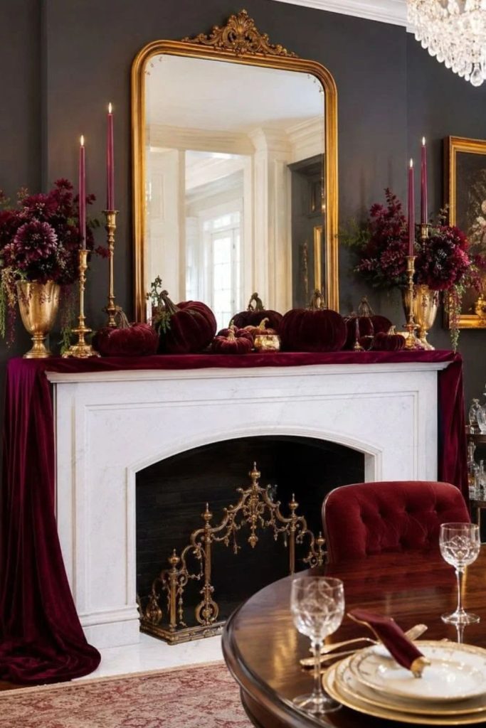 Moody burgundy mantel with elegant fall decor.