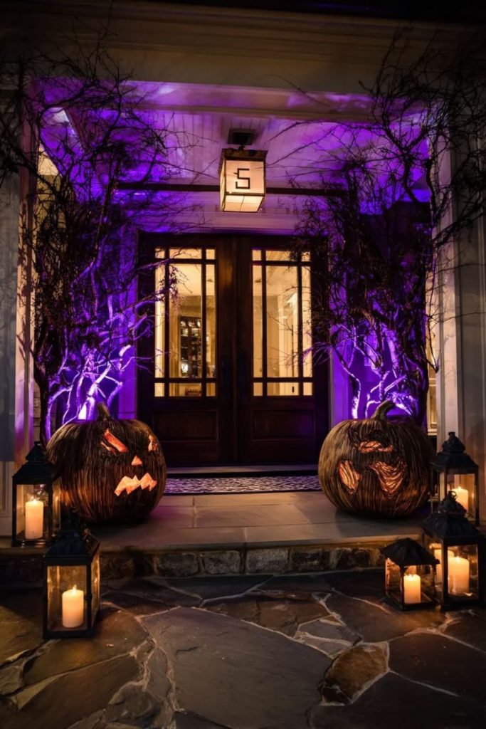 Glowing pumpkin lantern cathedral porch display.