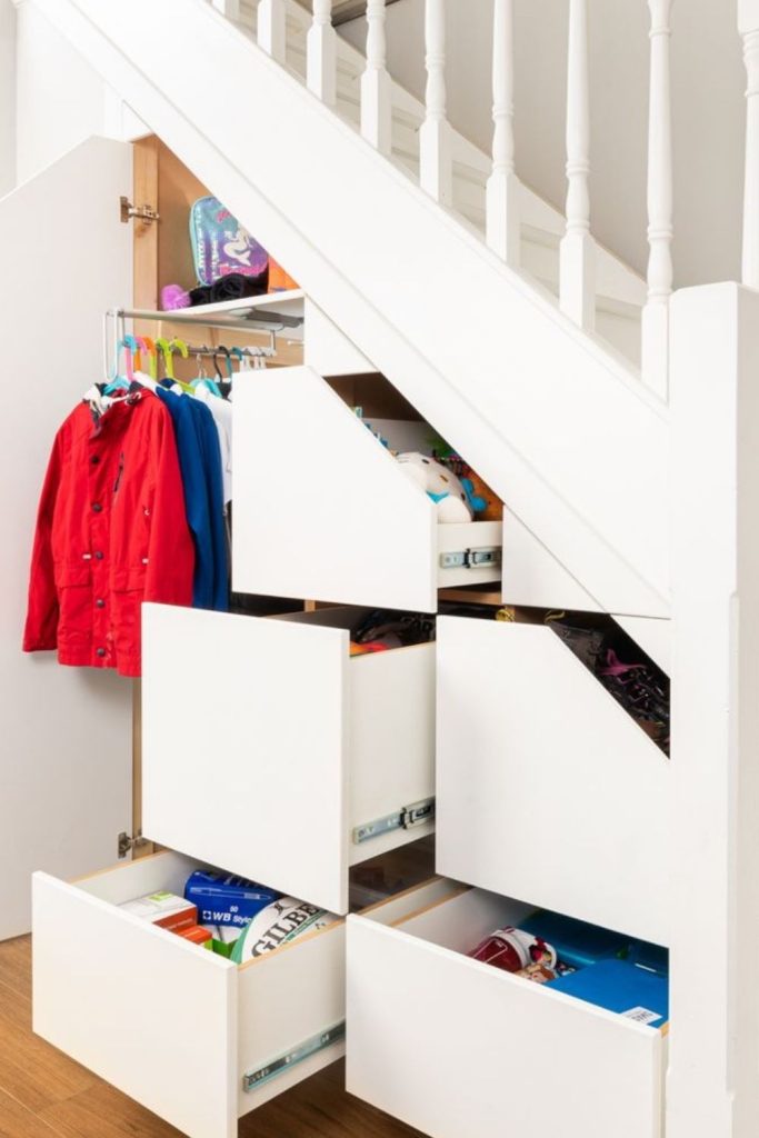 Seasonal storage vault beneath staircase.