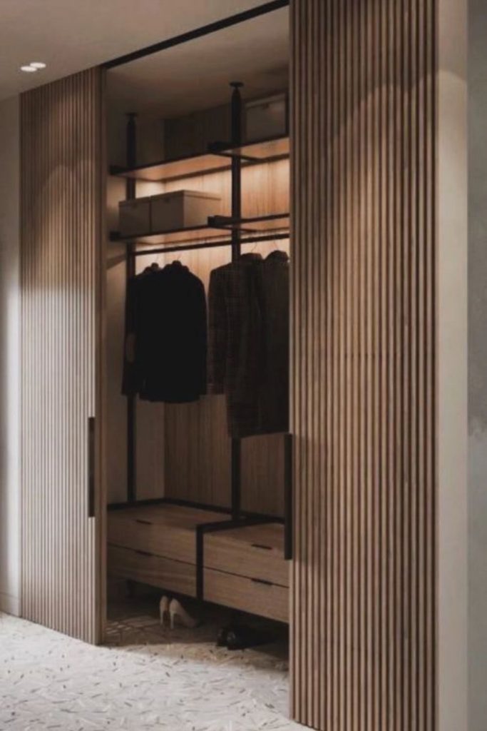 Slimline apartment walk-in wardrobe design.