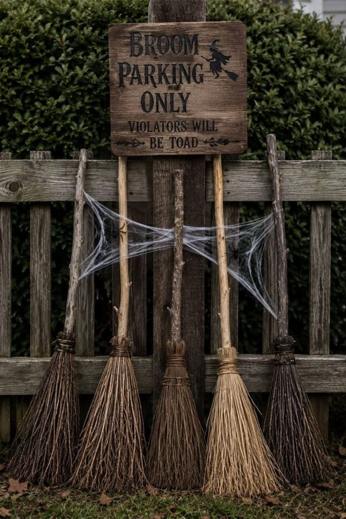 Rustic DIY witch broom porch display