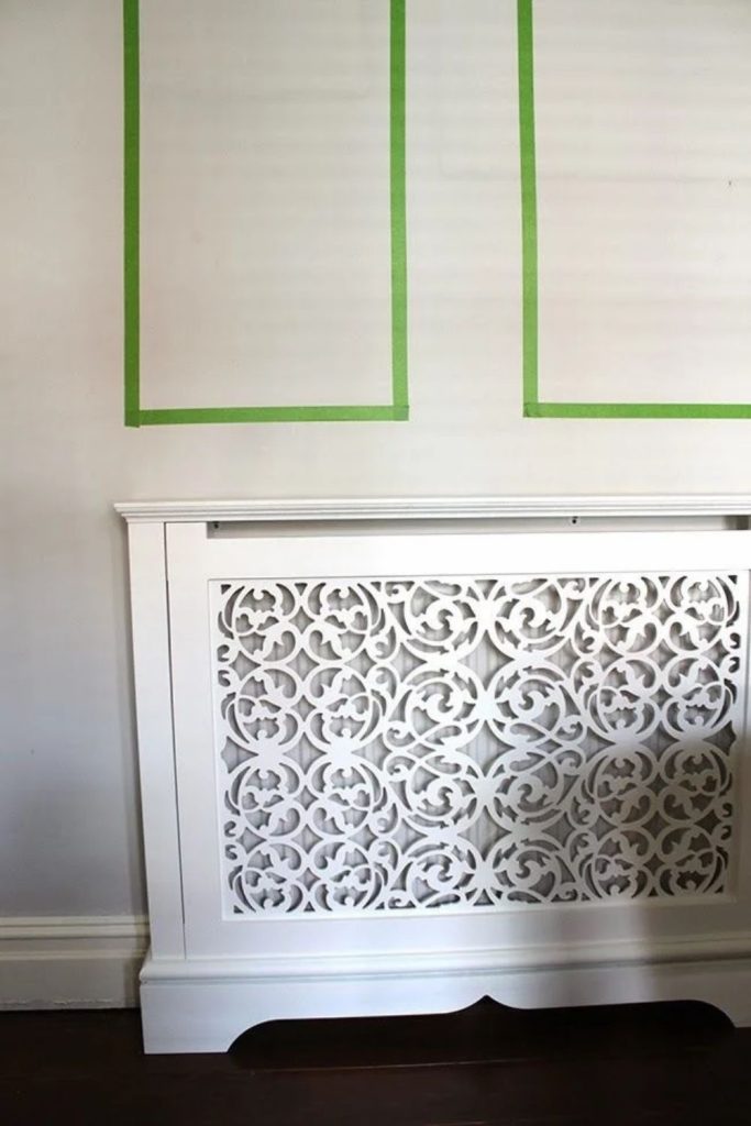 Botanical cutout decorative radiator cover.